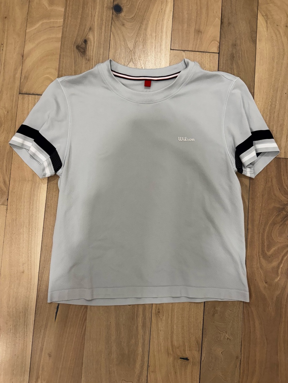 Wilson Light BlueShort Sleeve Athletic Tee with Black Stripe Detail